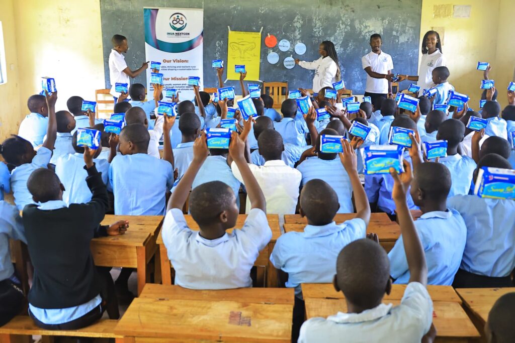 Girls receiving sanitary pads during the Inua NextGEN PAD Drive tackling period poverty in Kenya